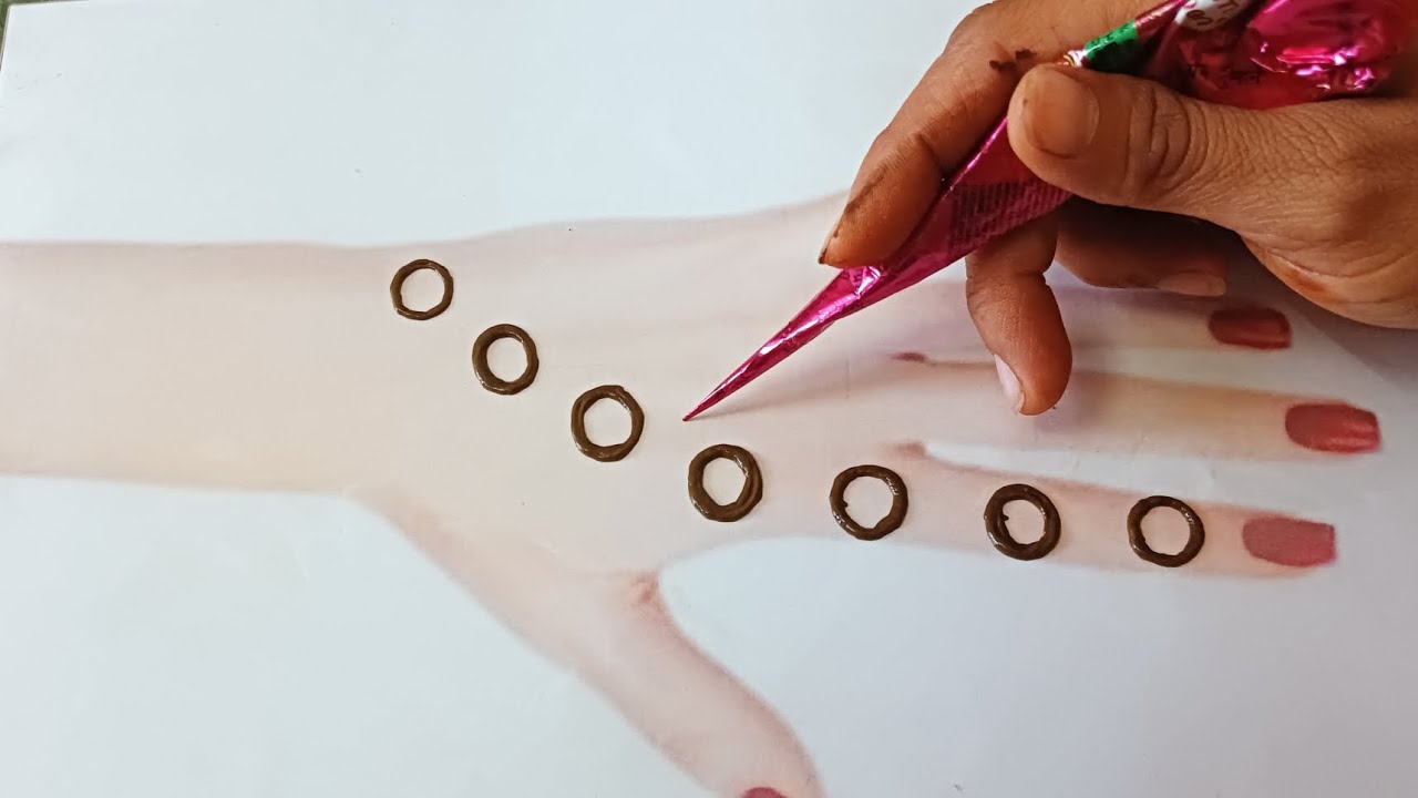 Easy trick mehndi design back hand round mehndi design ...