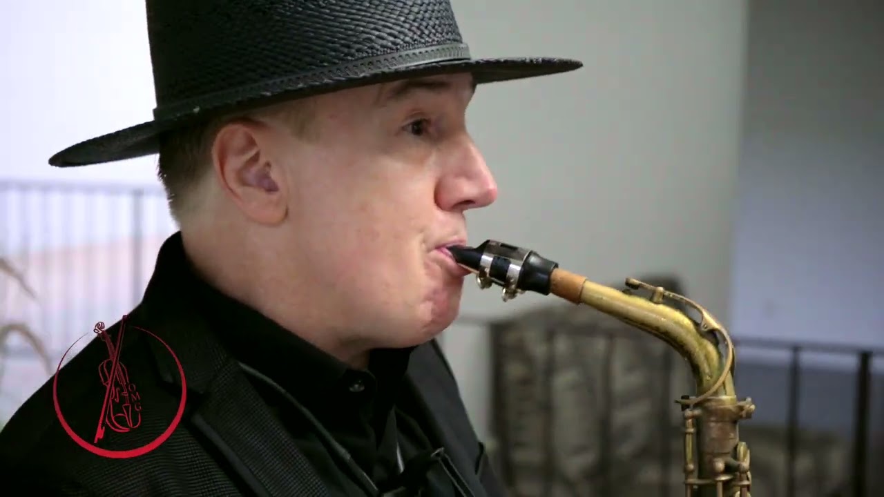 CJ performing Love Come Down as an interactive saxophonist