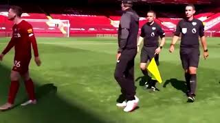 Liverpool defender Andrew Robertson slamming the Referee