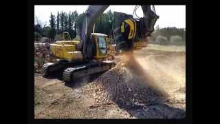 MB BF90.3 travaille sur une pelle Volvo et concasse du calcaire