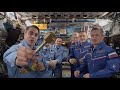 NASA's Chris Cassidy gives space station 'key' to Russia's Sergey Ryzhikov