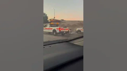 Workers try to corral reindeer trotting on 5 FWY