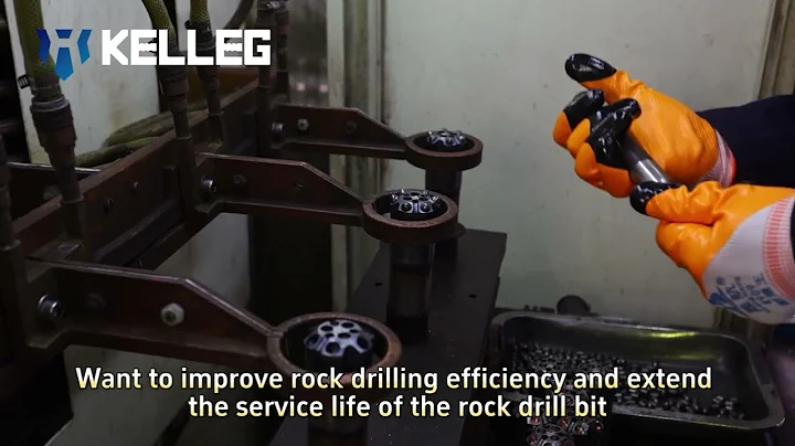Installing carbide button on rock drill bit
