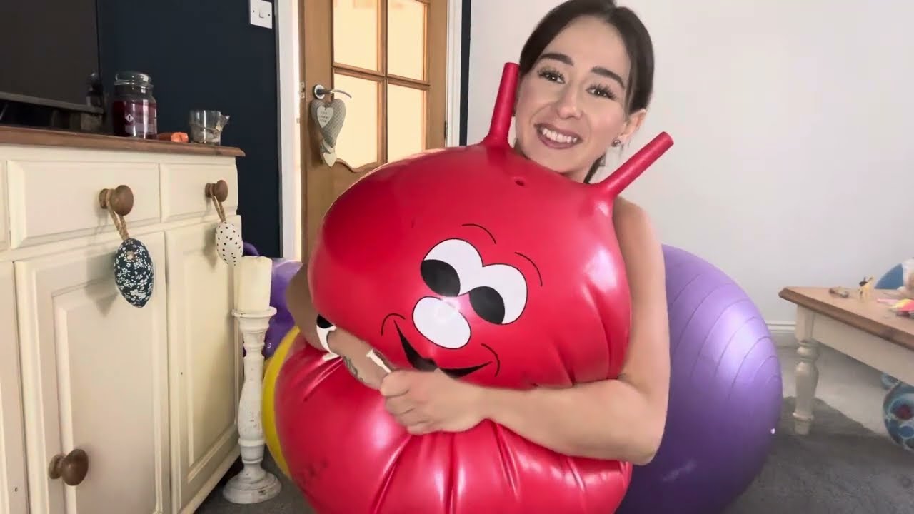 ASMR blowing up and deflating a red space hopper