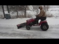 Plowing snow with lawn tractor WITHOUT TIRE CHAINS using 22in. atv tires.