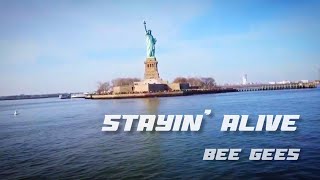 STAYIN' ALIVE : BEE GEES (LYRICS)