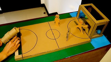 How to make desktop soccer game from cardboard ,a gun to fire the ball