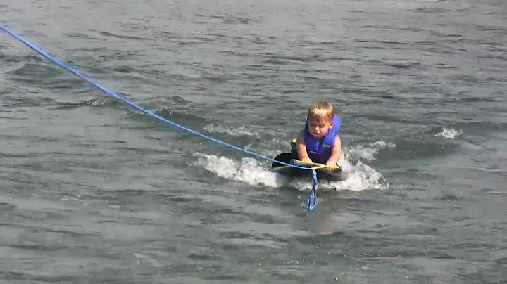 Allie and Jackson kneeboarding at Terry and Ken's Lake House