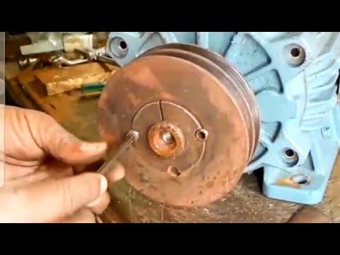 Videó: Hogyan lehet eltávolítani a szíjtárcsát a motor tengelyéről?