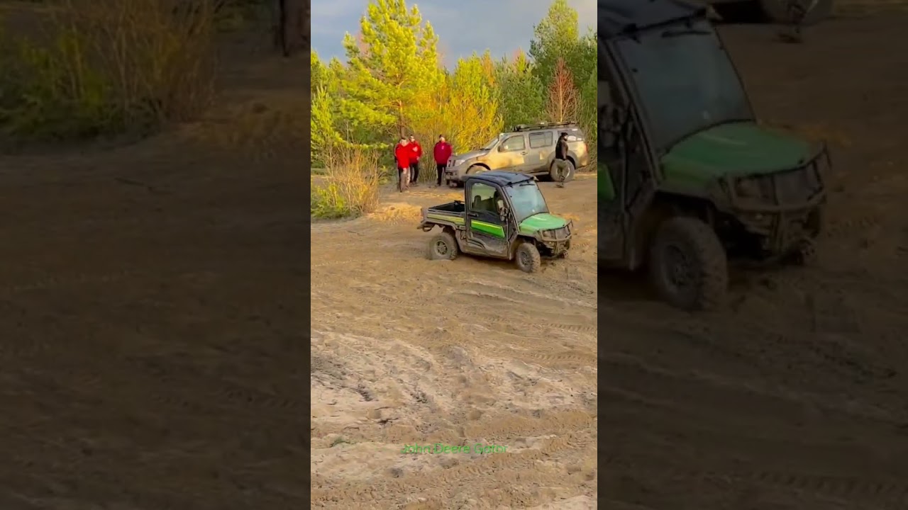 John Deere Gator 835M on sand