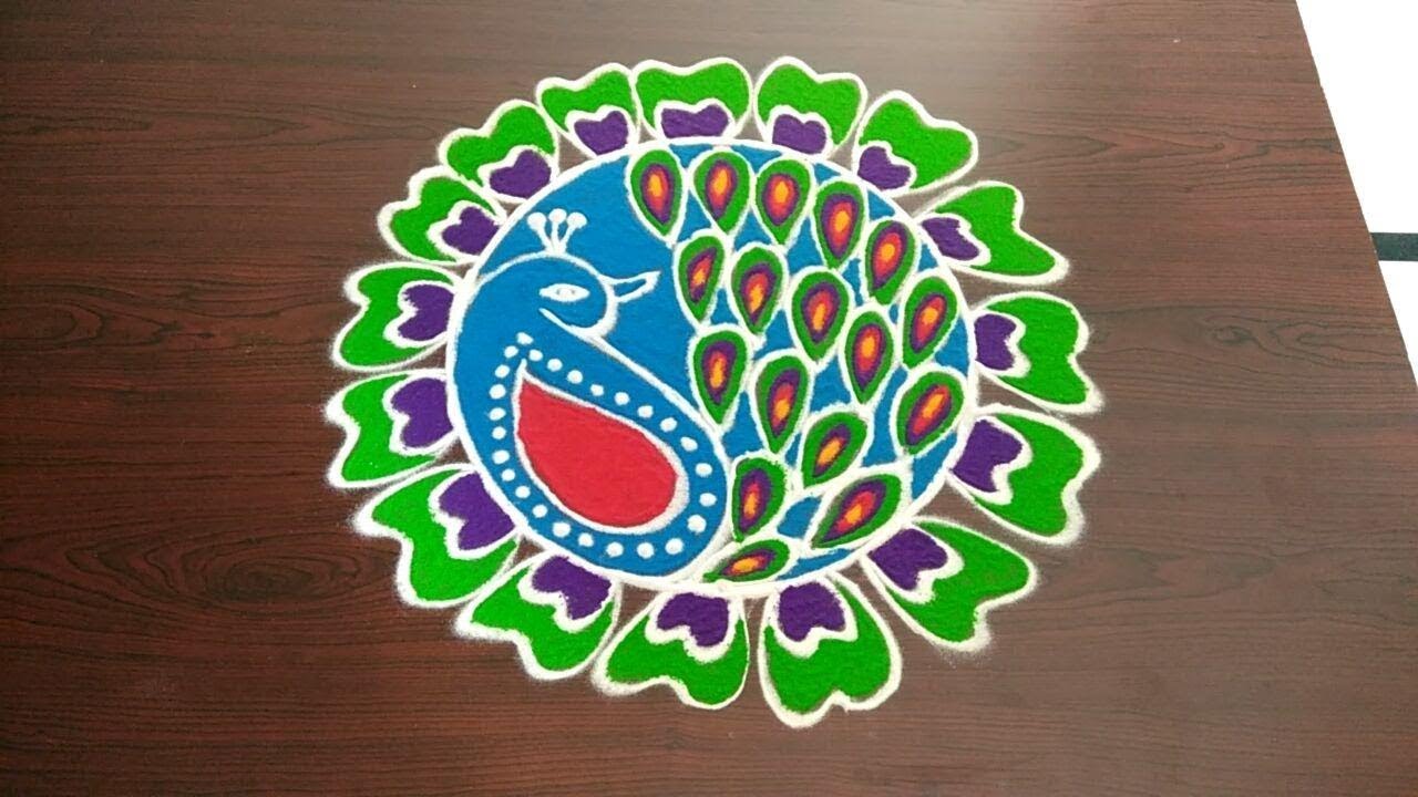 Featured image of post Peacock Design Muggulu Latest : These designs are drawn with marble powder or rice flour.