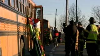 Students injured when SUV slams into bus