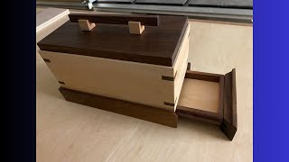 Jewelry box with a secret drawer