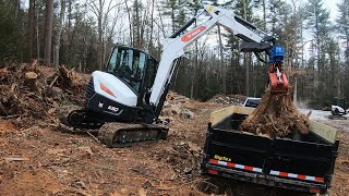 Loading out stumps with a Bobcat E50