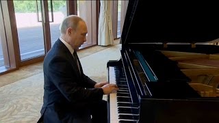 putin surprises with impromptu piano performance in beijing