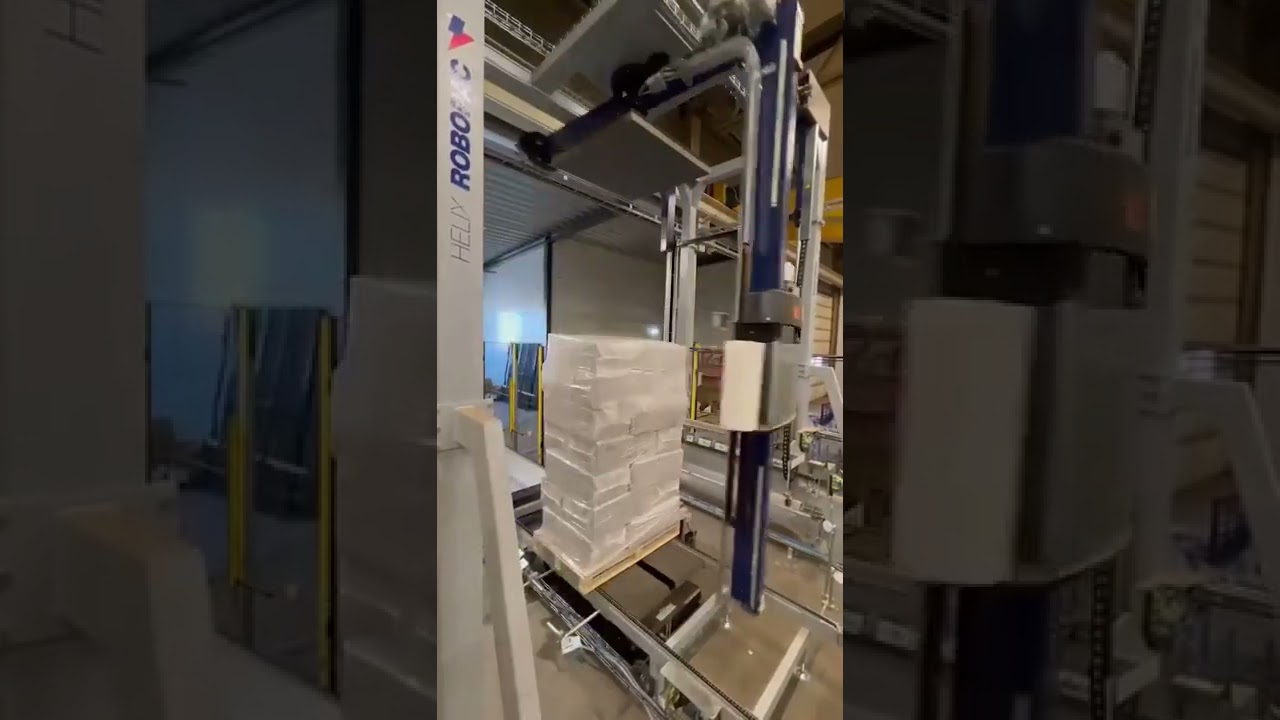 Автоматическая упаковка паллеты в стретч | Паллетообмотчик ROBOPAC HELIX EVO с укрыванием верха
