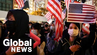Hong kong protesters held a thanksgiving day rally on thursday night
after u.s. president donald trump signed into law two bills aimed at
supporting human ri...