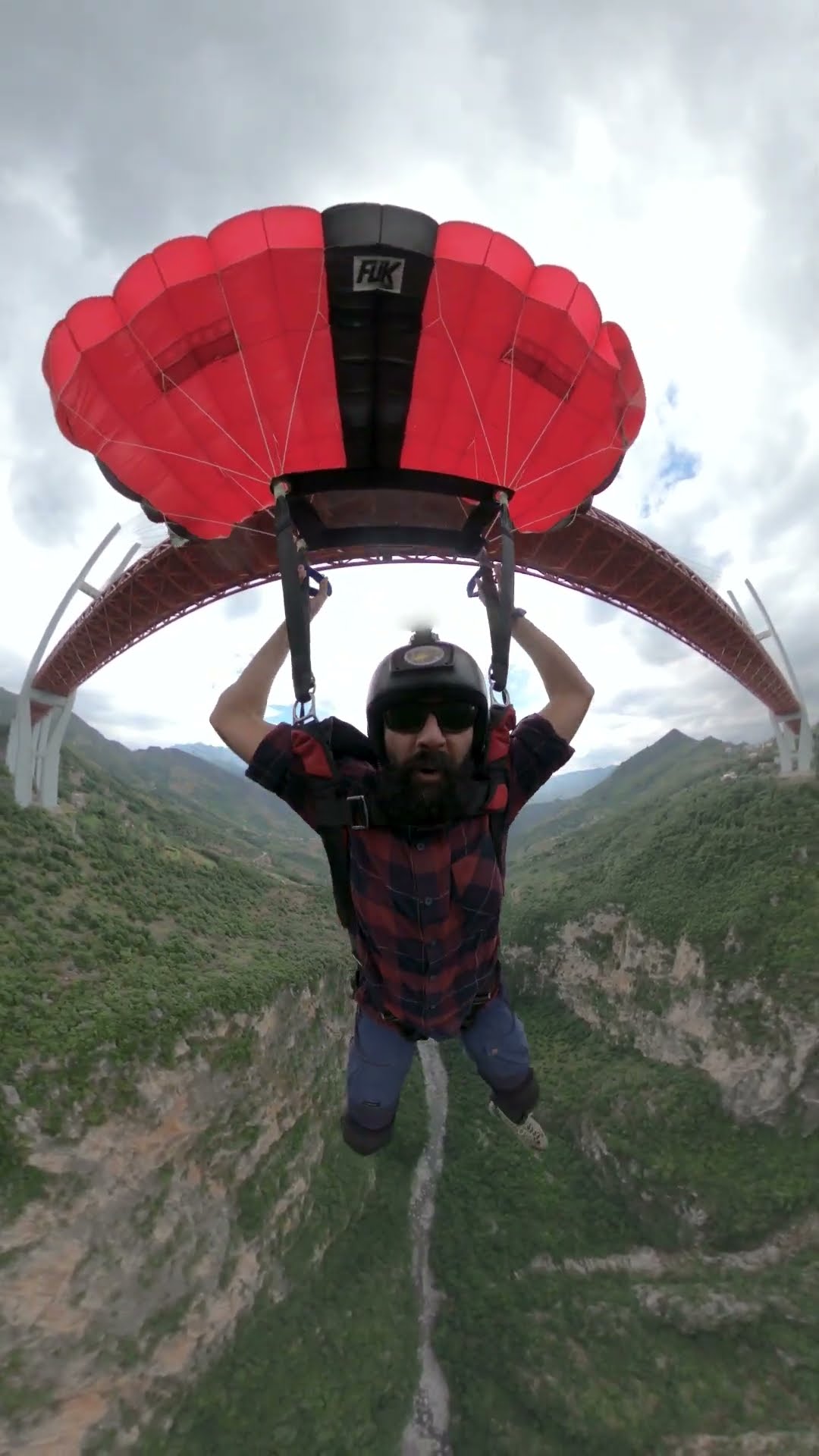 Base Jumper Leaps Off The Duge Bridge