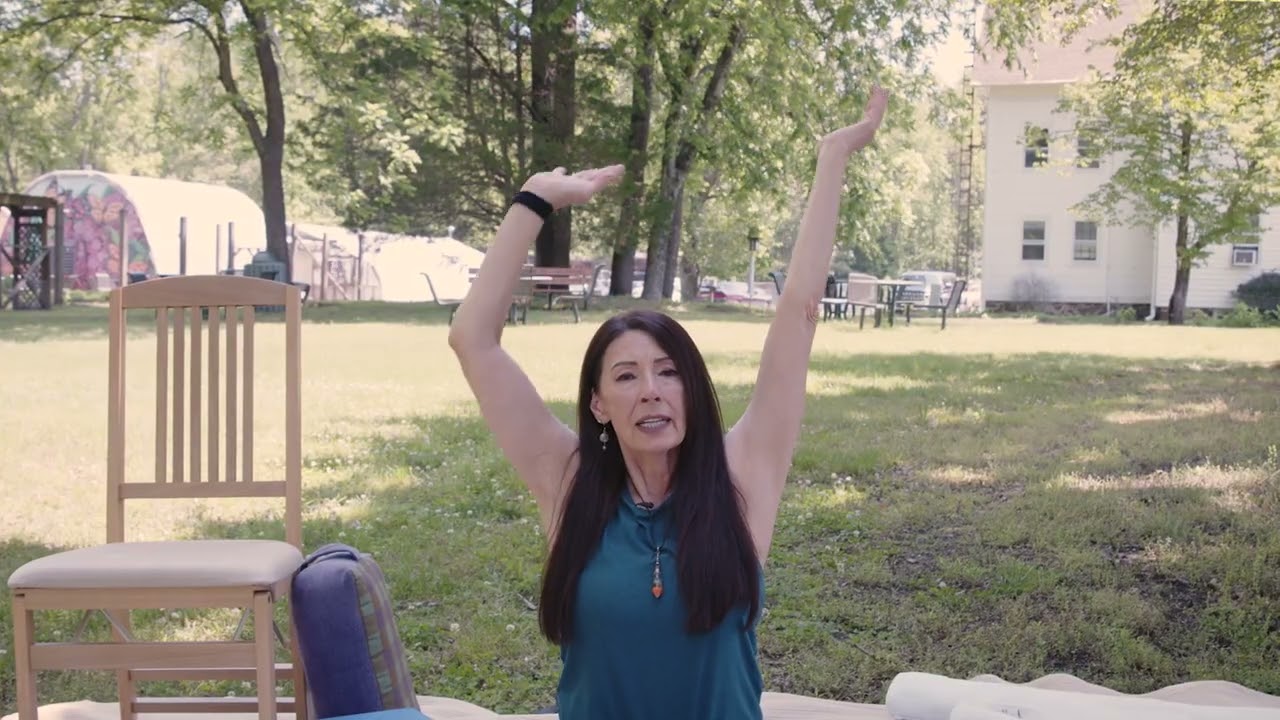 Easy Seated Side Bend: A Gentle Start from One of the Best Yoga Classes in Medford, New Jersey