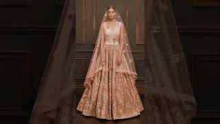 Bold Florals, Clic Corsets, And A Veil Spun With Legends.