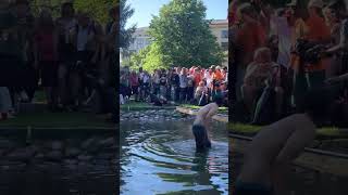 Skateboarder Falls after Skating on a Water Rail