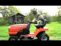 Evil Dog Riding a Lawnmower - Dramatic Dog Lawnmower Ride