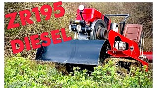 13hp Tracked Tractor climbing a steep hill