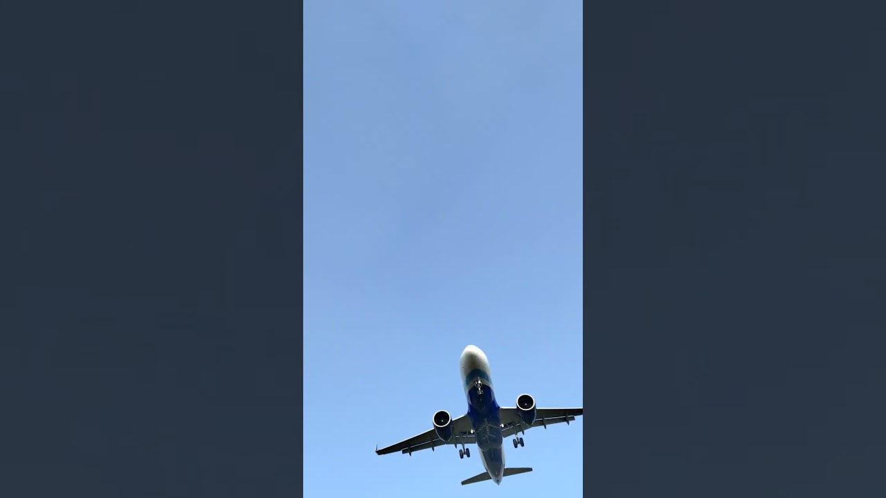 Indigo Airplane Crossed Above And Below Me 