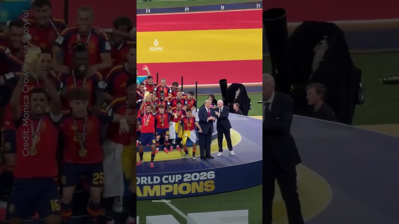 Infantino tries to usher Trump away as Spain lift World Cup