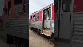 Diesel powered train departs from Espinho-Vouga station in Portugal
