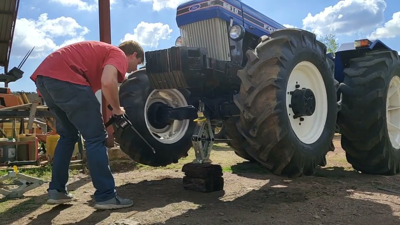 Gortech Heavy Duty scissor jack lifting a tractor YouTube