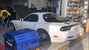 732 horsepower at the hubs from a 13B RX7 road car on pump fuel and a turbo from a JCB Generator?!