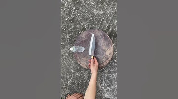 Tôi làm con dao phi lê cá bằng thép hòn bi tàu thủy sắc bén như nước vậy