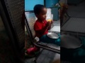 Thimlu eating mango