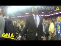 Body camera footage shows officer shove NBA team president l GMA