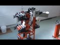 Machine for flexo printing and cutting the labels to the bottom of the bags