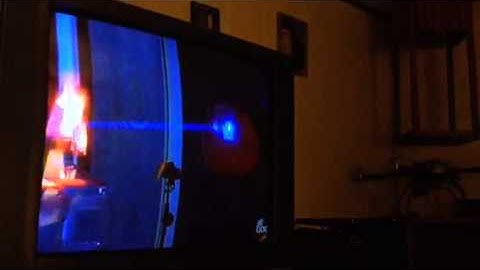 Kimmel exploding a pumpkin with a laser