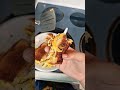 homeless man eat grilled cheese