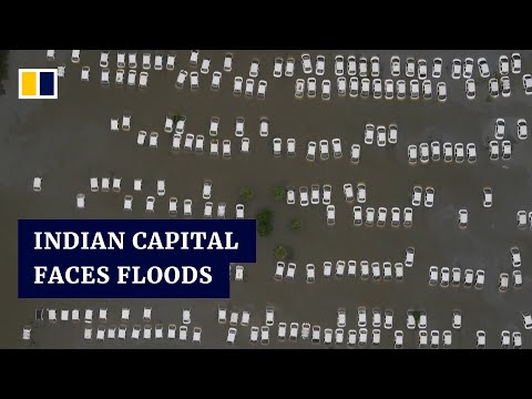 Heavy rain submerges homes and farmland around the Indian capital, New Delhi