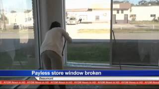 Vandal shatters store window