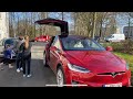 Presenting my red Tesla model X to my family