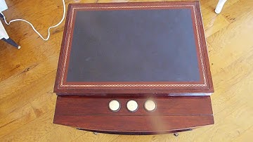 Magnavox Mid-Century Modern automatic record player playing an LP