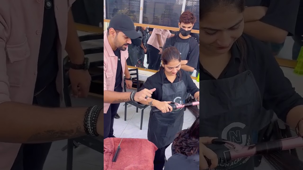 Naitik sir helping her do curls for the first time on a live client. Best academy for hair dressers