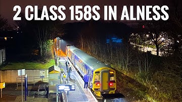2 Class 158s going through Alness