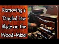 Removing a Tangled Saw Blade From the Wood-Mizer