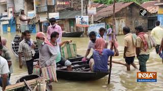 Watch: Low lying areas of WB's West Medinipur flooded, people use boats to commute