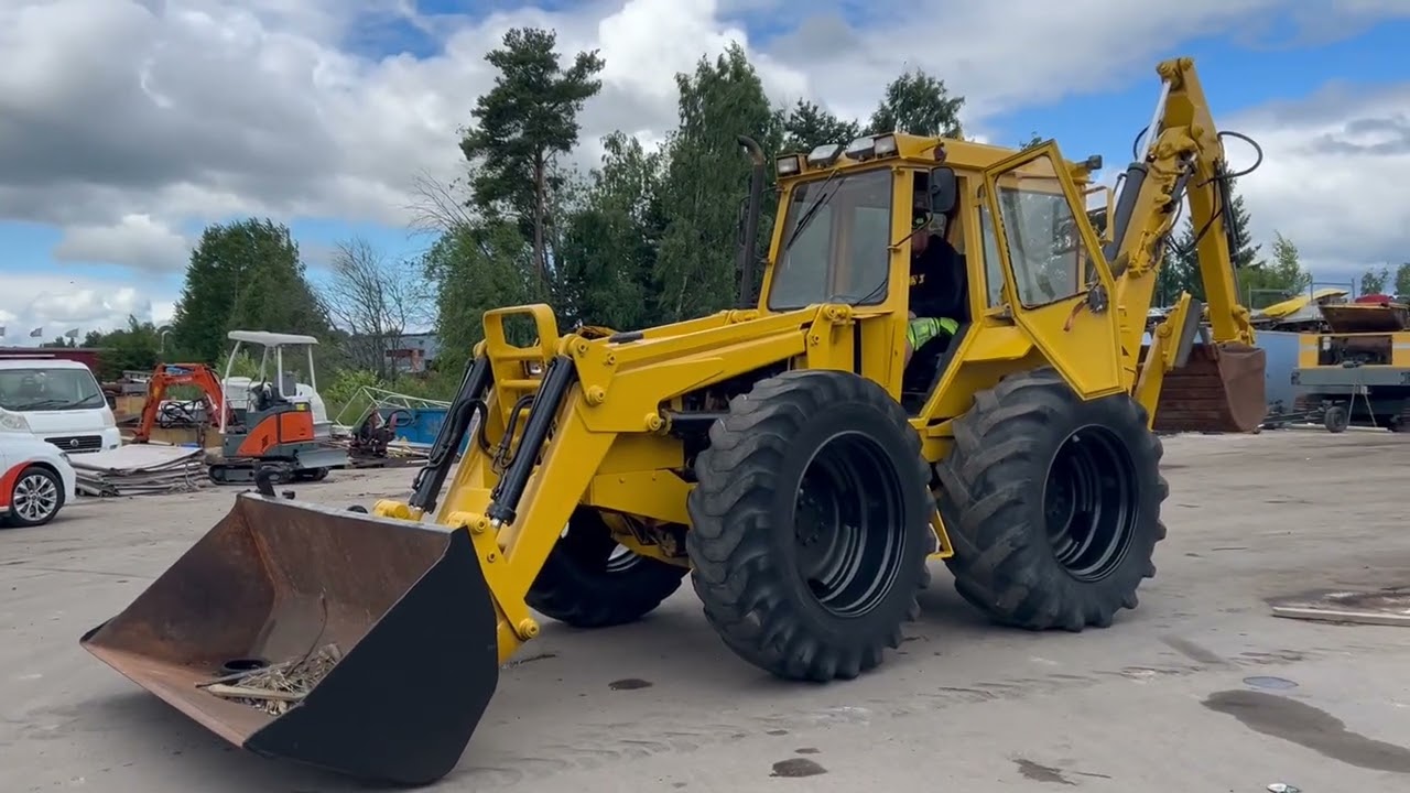 Traktorgrävare County Tractor 964