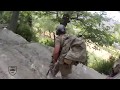 U.S. Special Operations Forces react to enemy ﬁre while on patrol in  in Nangarhar province