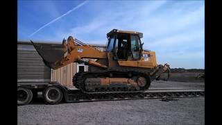 Unloading CAT 973C Crawler Loader...the wrong way!