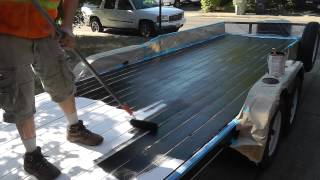 Harbor Freight Iron Armor Bed Liner painted on wood trailer